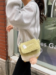 Cute lamb wool duck crossbody bag for women with astronaut bunny and pom-pom charm