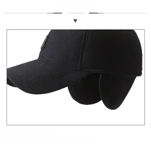 Detail of winter baseball cap showing thick wool fabric and foldable ear protection flap