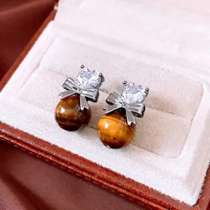 Retro heart zircon and tiger eye stone drop earrings with metallic bow on velvet box