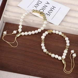 French vintage beaded pearl bracelet with gold heart charm and adjustable pull chain