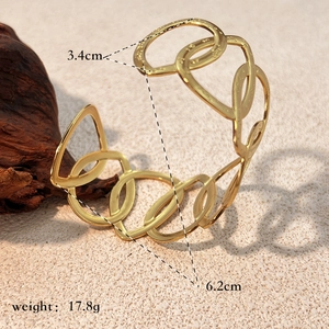 French style gold plated titanium steel open cuff bracelet with hammered hollow design