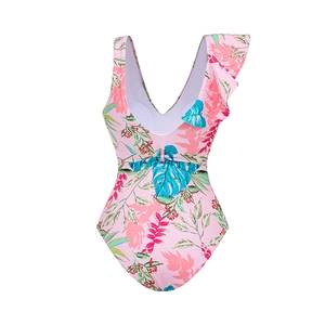 Detail of ruffled one-shoulder strap on tropical floral print one-piece swimsuit