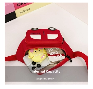 Internal storage detail of car-shaped children's chest bag showing capacity for daily items