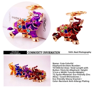 Detailed view of rhinestone elephant keychain charms in various enamel colors