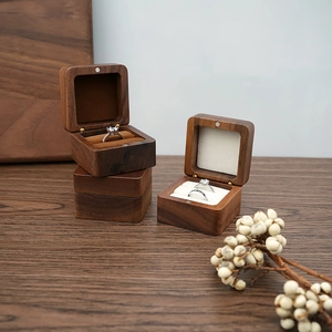 Handcrafted walnut wood ring box with magnetic closure and soft velvet interior lining