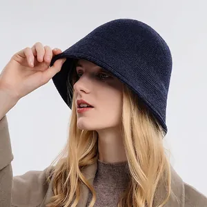 Women's knit bucket hat in navy blue, stylish warm fisherman style for winter fashion