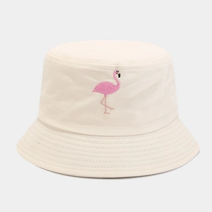 Creamy beige bucket hat featuring a delicate pink flamingo embroidery on the front panel