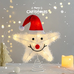 Luminous plush Christmas tree topper star with warm LED lights and a cute Santa hat