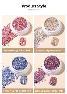 Macro view of holographic hexagon nail glitter flakes in pink, gold, blue, and purple