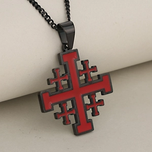 Black stainless steel Jerusalem cross necklace with red enamel finish on beige paper