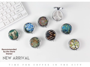 Top view of portable metal pill boxes with three compartments and artistic printed patterns