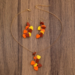 Autumn gold necklace and drop earrings set with orange yellow maple leaf charms