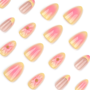 Pink and yellow gradient press-on nails with 3D embossed flowers and golden beads