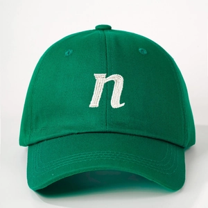 Retro dark green baseball cap with white letter n embroidery and adjustable strap back