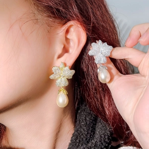 Elegant flower drop earrings with zircon crystals and pearl teardrops in gold and silver