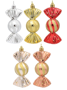 Detail of candy-shaped Christmas ornaments with glitter coating and hanging loops