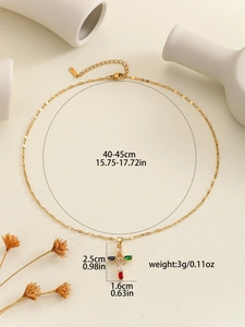 Detail showing dimensions of gold cross necklace with vibrant colored cubic zirconia
