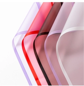 Close-up of semi-transparent waterproof flower wrapping paper with colorful matte borders