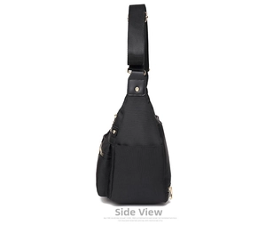 Side view of black water-resistant nylon crossbody bag with multi-layer zippers and gold hardware