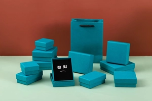 Macro view of Tiffany blue jewelry gift boxes and bags in square and rectangular shapes