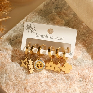 Detailed set of six gold stainless steel hoop earrings with celestial and floral charms