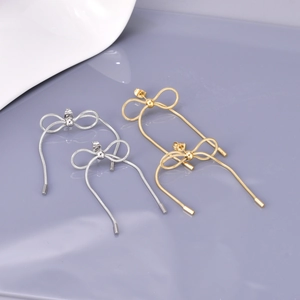 Elegant gold and silver bow tassel earrings with snake chain in high-quality titanium steel