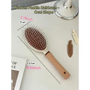 Detailed dimensions of wooden cushion hairbrush showing 25cm length and 7cm width size