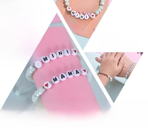 Detail of beaded Mama and Mini bracelet set with light green natural stone beads