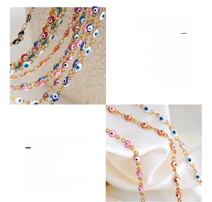 Detail of 18K gold plated titanium steel necklace with colorful evil eye enamel charms