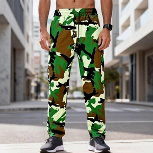 Men's camouflage urban cargo pants with drawstring waist shown in a street fashion style