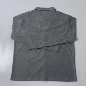 Detailed back view of grey corduroy long sleeve shirt showing fabric texture and seams