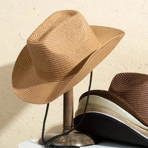 Handwoven straw cowboy sun hat with wide brim and adjustable chin strap in various colors