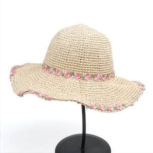 Women's summer straw sun hat with pink flower embroidery for beach vacation