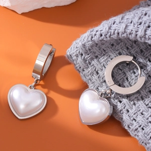 Elegant silver steel hoop earrings with hanging white heart-shaped pearl pendants