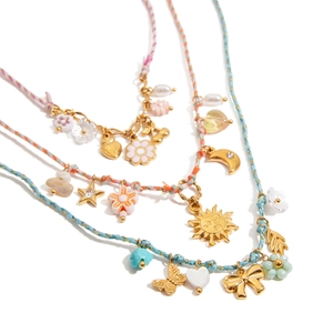 Three colorful braided cord necklaces with gold pendants and charms for summer jewelry