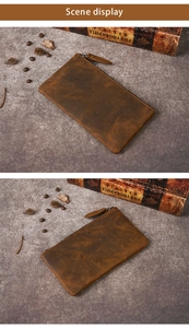 Close-up of brown crazy horse leather clutch bag with natural vintage texture and zipper