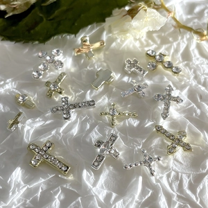Exquisite 3D cross nail art charms in gold and silver finish with sparkling rhinestones