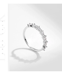 Macro side view of S925 sterling silver ring with seven marquise-cut sparkling stones