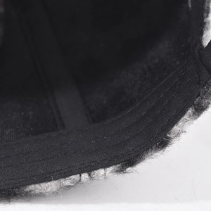 Close-up detail showing the inner lining and premium stitching of the wool baseball cap