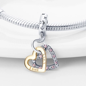 Silver beaded bracelet with double heart pendant engraved with Love and Luck words