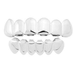 Detailed view of polished silver hip hop grillz set for upper and lower teeth