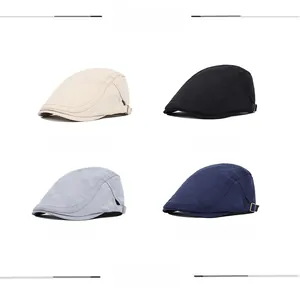 Detail view of plaid newsboy caps in four colors featuring adjustable metal side buckles
