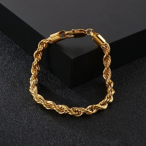 Detailed view of a 6mm golden stainless steel rope chain bracelet with lobster clasp