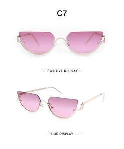 Pink lens cat eye sunglasses with gold semi-rimless metal frame in front and side views