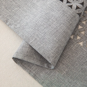 Gray linen table runner with minimalist cutout floral pattern in American rural style