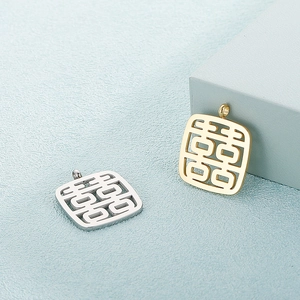 Golden and silver square hollow pendants with Double Happiness symbol on blue background