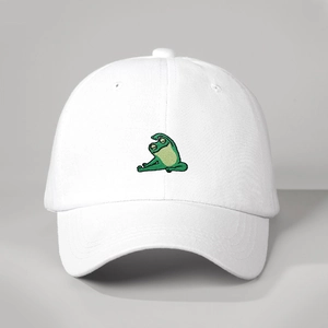 White cotton baseball cap featuring green frog embroidery and adjustable strap