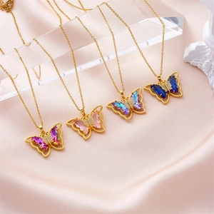 Colorful crystal butterfly necklace set in gold-plated steel with zircon accents