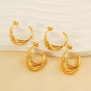 Polished golden multi-layer intertwined C-shaped hoop earrings with 18K gold finish