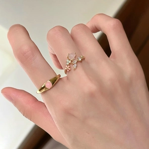 Elegant S925 silver rings set with pink gemstone and floral pearl design on hand